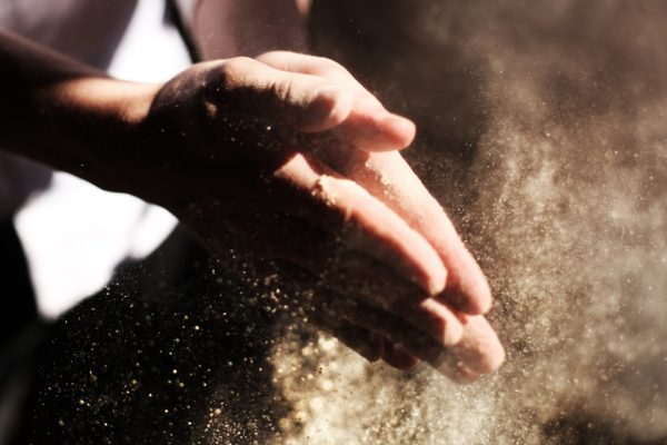 Hände und Sand